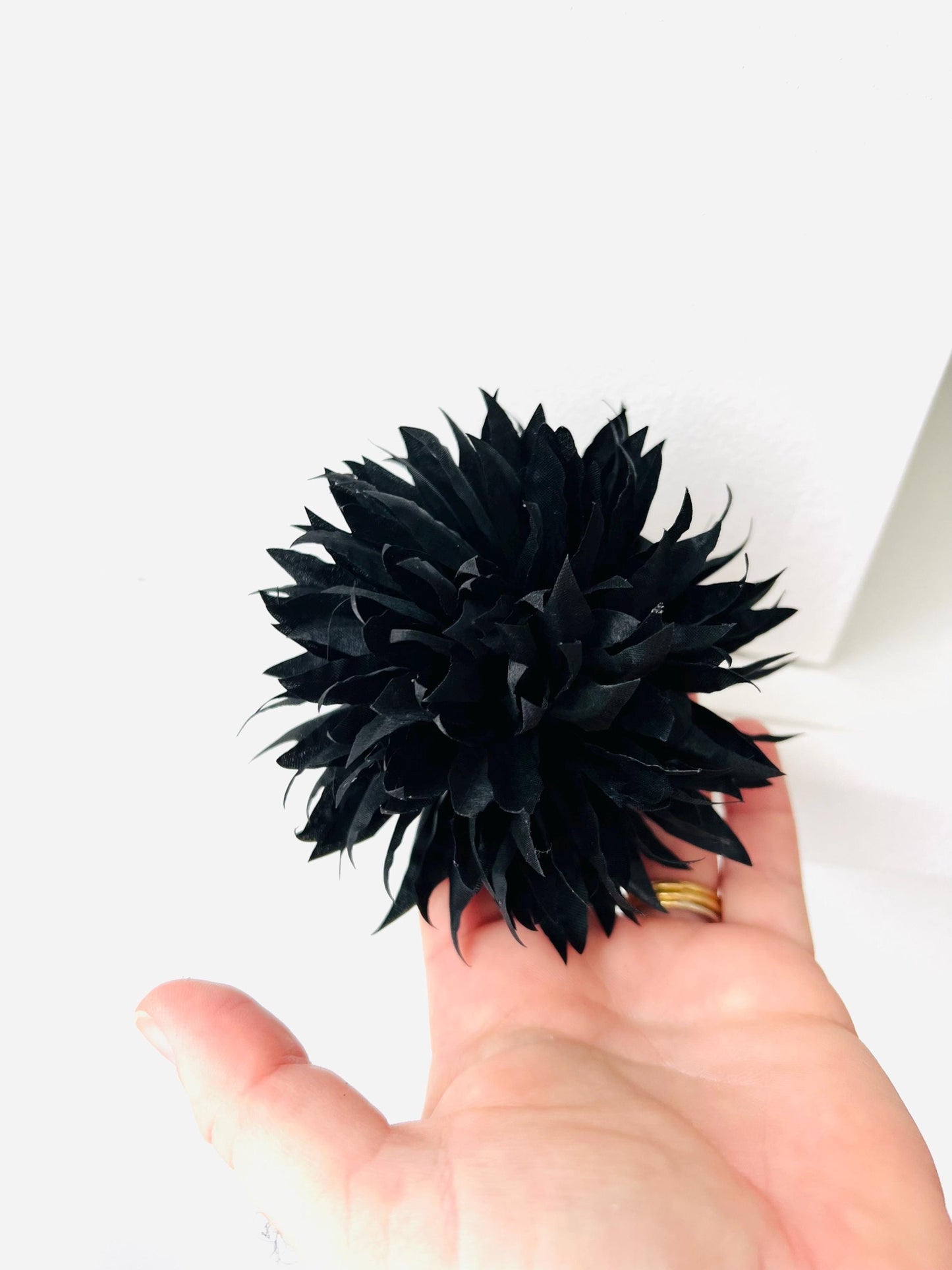 Handcrafted Satin Flower Pin: Elegant Black & Red Accent