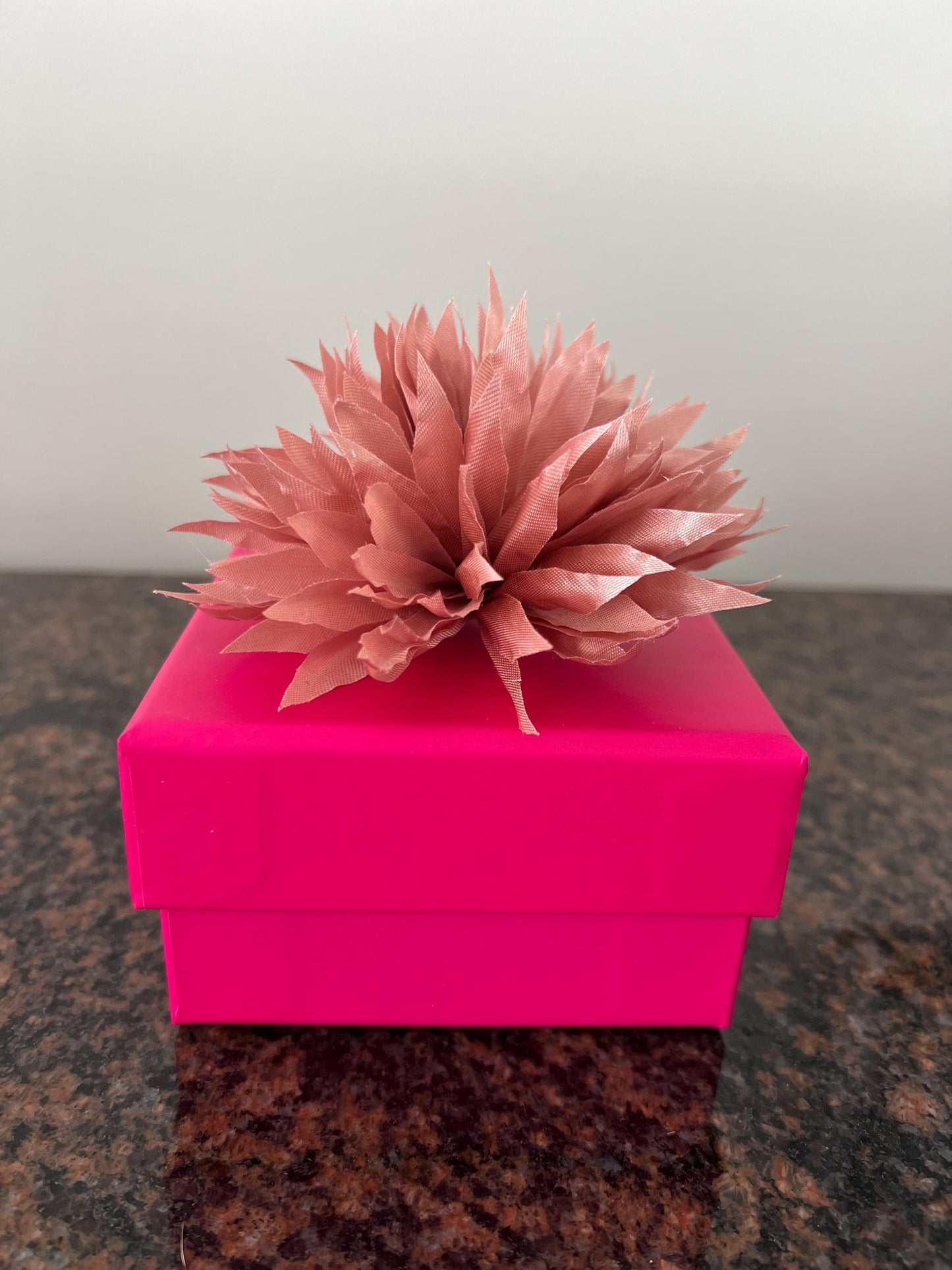 Handcrafted Satin Flower Pin: Elegant Black & Red Accent