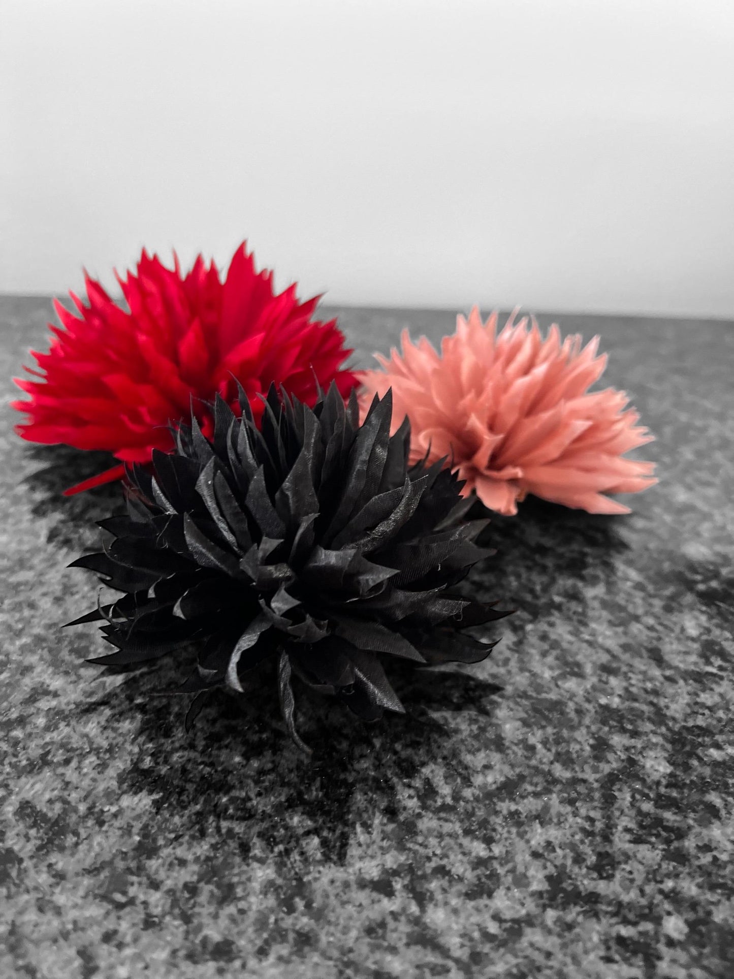Handcrafted Satin Flower Pin: Elegant Black & Red Accent