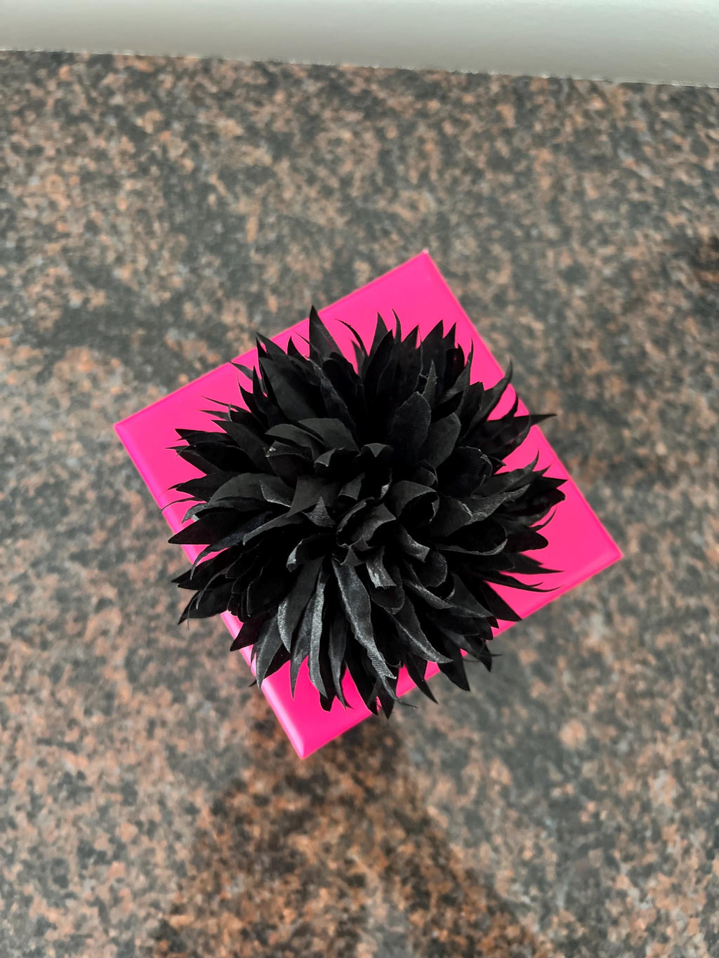 Handcrafted Satin Flower Pin: Elegant Black & Red Accent